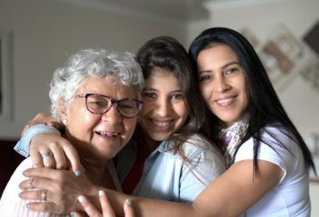 group of female family members embracing